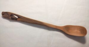 Lilac wood stir fry spoon with natural knot hole SF10